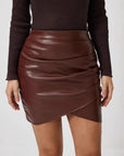 Women's Elegant PU Leather A-Line Mini Skirt – High Waist Slim Fit Short Skirt with Smooth Finish & Chic Commuter Style