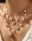 Women's Ocean Pearl Tassel Necklace – Starfish and Shell Beach-Inspired Pendant
