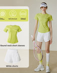 A woman modeling a lime green short-sleeve athletic T-shirt and white tennis shorts, standing indoors and holding a tennis racket. An inset panel on the left shows the shirt and shorts separately with text labels and three feature icons.