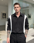 Chemise noire soyeuse et sans plis