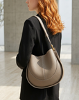 Damen PU-Leder Sattel-Schultertasche – Runde Retro Umhängetasche mit mehreren Fächern